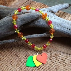 Handmade bright bead bracelet with neon hearts